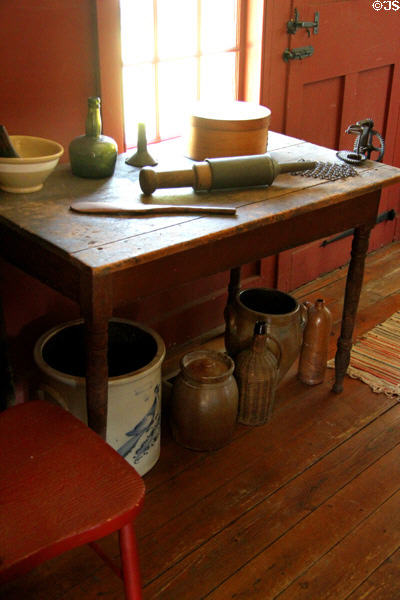Kitchen with collection of containers & sausage press at Strong House. Windsor, CT.