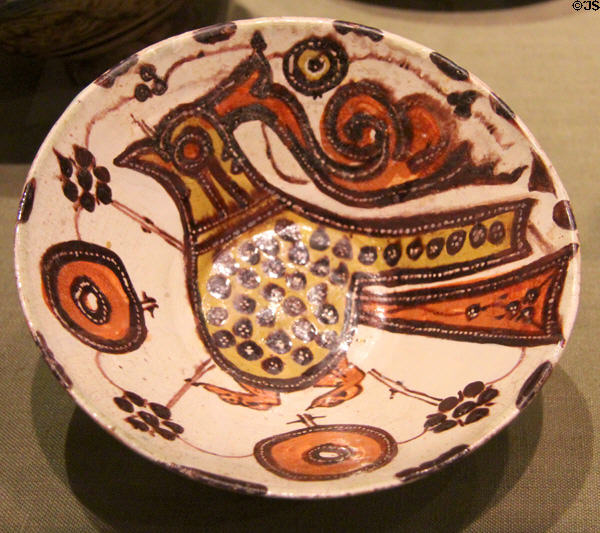 Earthenware bowl depicting bird & flowers (11thC) from Iran at San Antonio Museum of Art. San Antonio, TX.