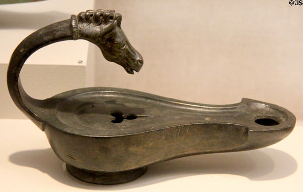 Roman bronze lamp with horse's head handle (1stC CE) at San Antonio Museum of Art. San Antonio, TX.