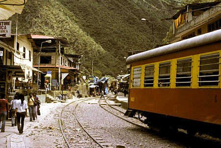 Railway down main street of Aguas Calientes, town below Machu Picchu. Peru.