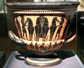 Greek ceramic black figure on red krater painted with warriors & horses at Kunsthistorisches Museum. Vienna, Austria.