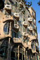 Balconies & window bays project from facade of Gaudi's Casa Batlló. Barcelona, Spain.