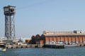 Torre d'Alta Mar Telefèric terminal over shipyards. Barcelona, Spain.