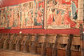 Tapestries over Medieval choir stools at Cluny Museum. Paris, France.