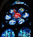 Vision of Apocalypse surrounded by Evangelists detail on Chagall stained glass window at Reims Cathedral. Reims, France.
