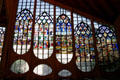 Stained-glass windows from destroyed St Vincent's church expanded & inset at modern St Joan of Arc Church. Rouen, France.