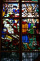 Stained-glass windows with scenes of martyred saints at St Joan of Arc Church. Rouen, France.