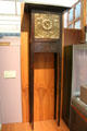 Glasgow-style Art Nouveau tall clock with brass face by Margaret Thomson Wilson at Kelvingrove Art Gallery. Glasgow, Scotland