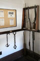 Former sheriff's office rifles & hand cuffs at Tombstone Courthouse Museum. Tombstone, AZ.