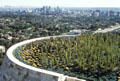 Skyline with 3 clusters of highrises: downtown LA, Century City & Westwood from Getty Museum garden. Los Angeles, CA.