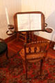 Double music stand with four candle holders at Davis House Museum. San Diego, CA
