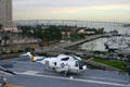 View of helicopter & Coronado Bridge from bridge of Midway aircraft carrier. San Diego, CA.