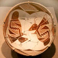 Mimbres native pottery bowl with opposing insects from southern New Mexico at de Young Museum. San Francisco, CA.