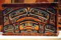 Tlingit wooden chest with lid with image of grizzly bear at Denver Art Museum. Denver, CO