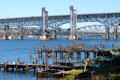 Interstate highway & rail lift bridge over Thames River as seen from Groton. Groton, CT.