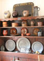 Collection of stoneware, redware, wooden boxes & pewter at Judson House. Stratford, CT.