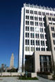 Bienville Building corner with Louisiana State Capitol beyond. Baton Rouge, LA.
