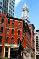 Batterymarch St. heritage streetscape with red corner building & Custom House Tower. Boston, MA.
