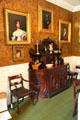 Sideboard in dining room with Appleton family portraits at Longfellow National Historic Site. Cambridge, MA.