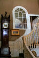 Dutch clock acquired by Longfellow & original stair landing window at Longfellow National Historic Site. Cambridge, MA.