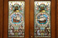 Stained glass window with colonist ships Mayflower & Arbella at Massachusetts State House. Boston, MA.