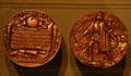 Copper medals commemorating 1893 World's Columbian Exposition in Museum of Nebraska History. Lincoln, NE.