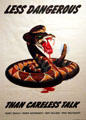 WW II poster with rattlesnake warning against careless talk at New Mexico History Museum. Santa Fe, NM