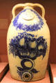 Stoneware water jug painted with fruit by J&E Norton Pottery of Bennington, VT at Bennington Museum. Bennington, VT.