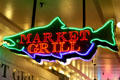 Neon fish sign in Pike Place Market. Seattle, WA.
