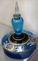 Arlington stoppered perfume bottle in blue with blue, pink, black & gold trim at Fostoria Glass Museum. Moundsville, WV.