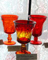 Jamestown water goblets in red & amberina at Fostoria Glass Museum. Moundsville, WV.