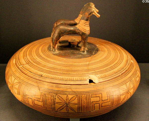 Greek ceramic pyxis with horses on cover from middle geometric period (780-760 BCE) at Kunsthistorisches Museum. Vienna, Austria.