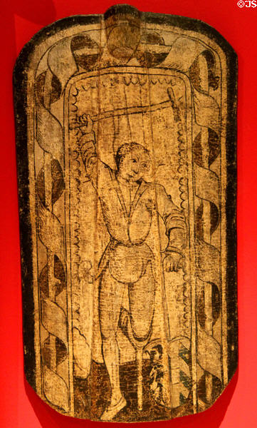 Medieval shield showing invalid with wooden leg (c1493) at Historical Museum of City of Vienna. Vienna, Austria.