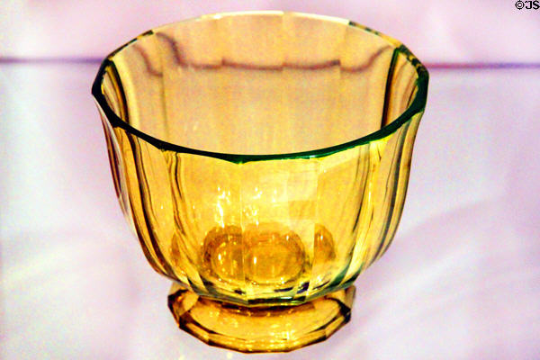 Radium green glass flower bowl (1915) by Josef Hoffmann & made for Wiener Werkstätte at Historical Museum of City of Vienna. Vienna, Austria.