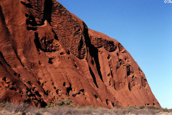 Caves on face of Uluru (aka Ayers Rock). Australia.