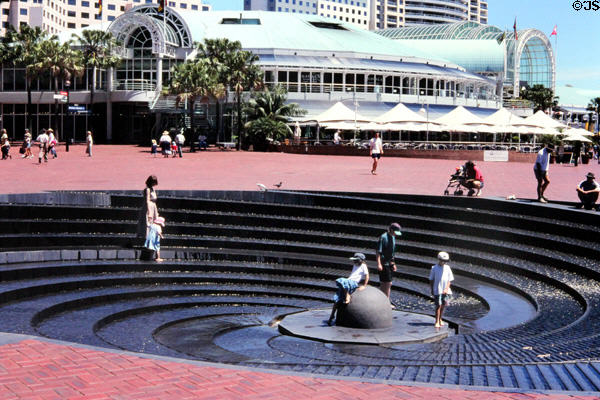 Fountain & shopping arcades of Darling Harbour. Sydney, Australia.
