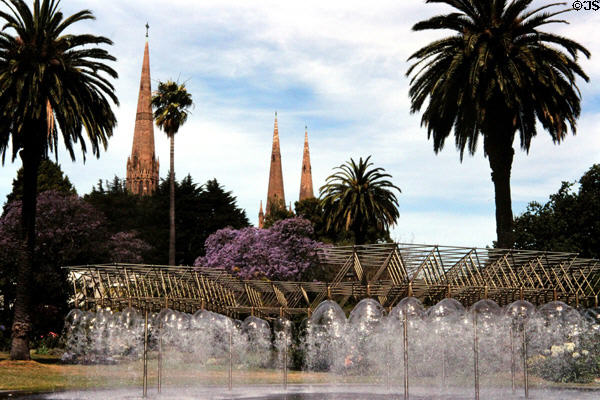Fountains produce domes of water in Parliament Gardens (1880). Melbourne, Australia.