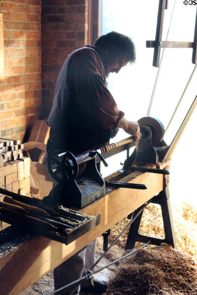 Furniture maker working on a antique lathe. Ballarat, Australia.
