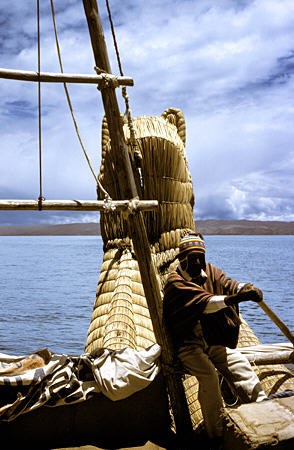 Rower of reed boat at Sun Island. Bolivia.