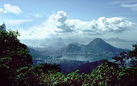 How Rio de Janeiro wraps itself around the hills, Sugarloaf, the harbor and Corcovado, where the statue of Christ stands. Brazil.