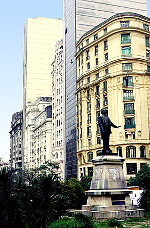 Statue, buildings, and park next to City Hall in Rio de Janeiro. Brazil.