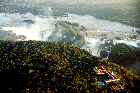 Aerial view of the Iguaçu Falls National Park with the luxury Hotel des Cataratas in the foreground. Brazil.