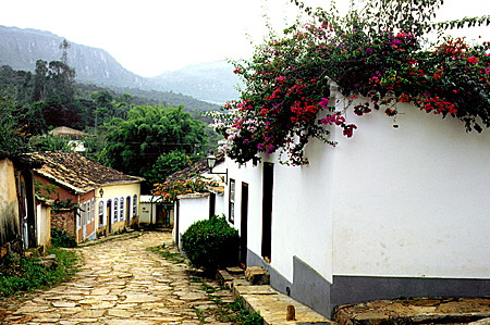 Small street with flowers on a building in the heritage village of Tiradentes. Brazil.