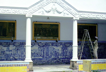 Church courtyard with Portuguese tiles and painter, in Salvador. Brazil.