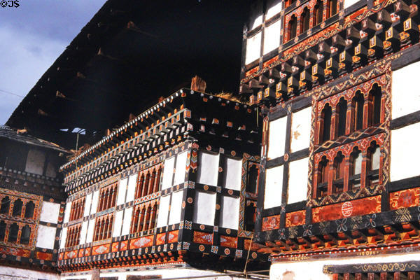 Carved & painted wood architecture of house in Paro. Bhutan.