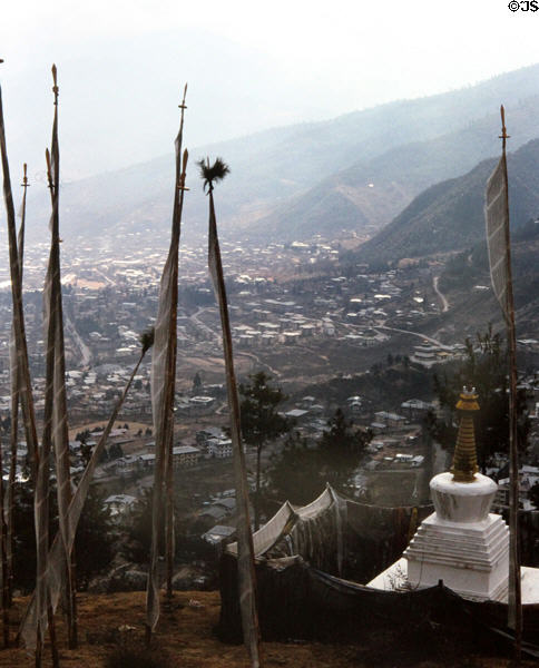View of Thimpu from stupa & prayer flags near area's radio tower. Bhutan.