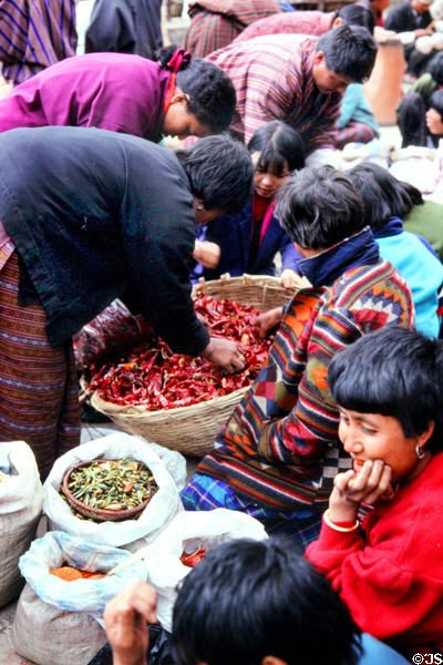 Socializing, selling & purchasing goods at Saturday market in Thimpu. Bhutan.