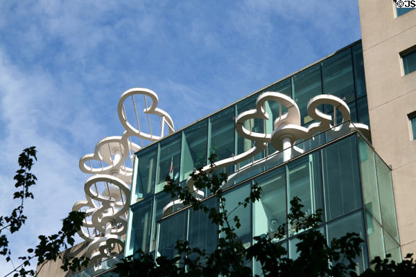 Cloud art by Alan Chung Hung on roofline of 938 Howe Street (1991) (11 floors). Vancouver, BC. Architect: Bing Thom Architects.