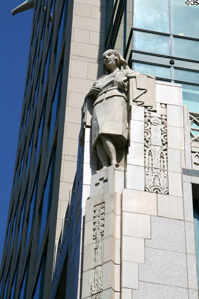 Carved nurse on facade of Cathedral Place. Vancouver, BC.
