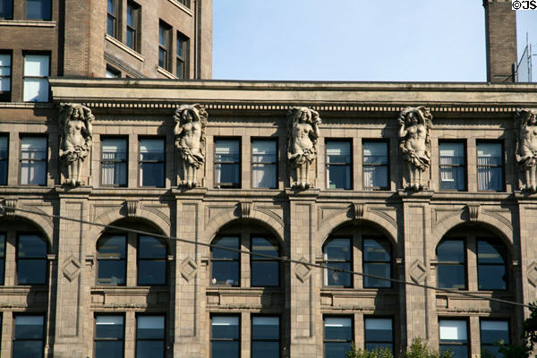 Row of terra cotta nude females on Sun Tower facade. Vancouver, BC.